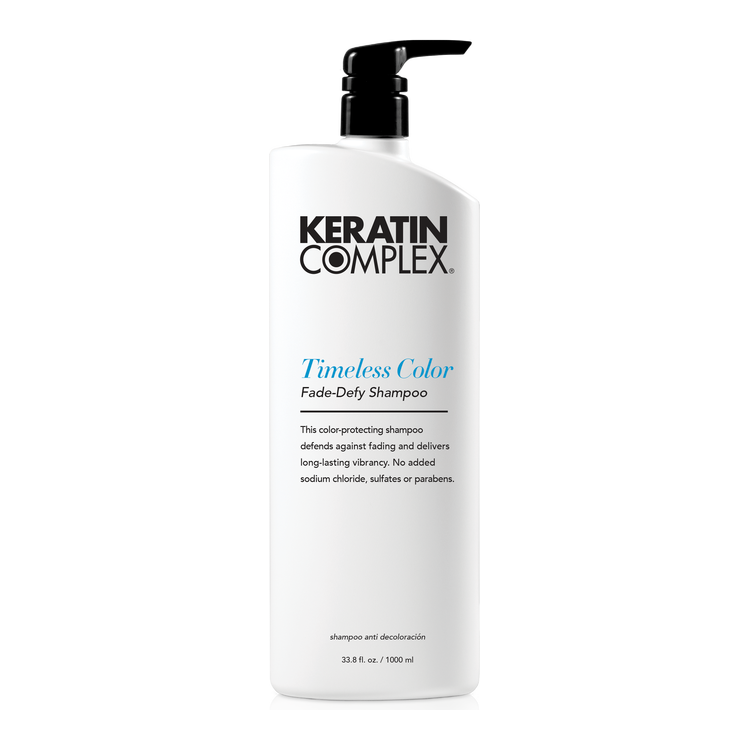 Shampo kundër zbehjes së ngjyrës Keratin Complex Timeless Color Fade-Defy - 975 ml