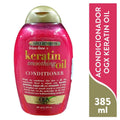 Balsam vaji zbutës OGX Frizz-free + Keratin, 385 ml